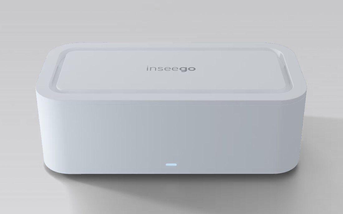 The Inseego 5G router: a small white box with the Inseego name on the lid and a status light on the front.